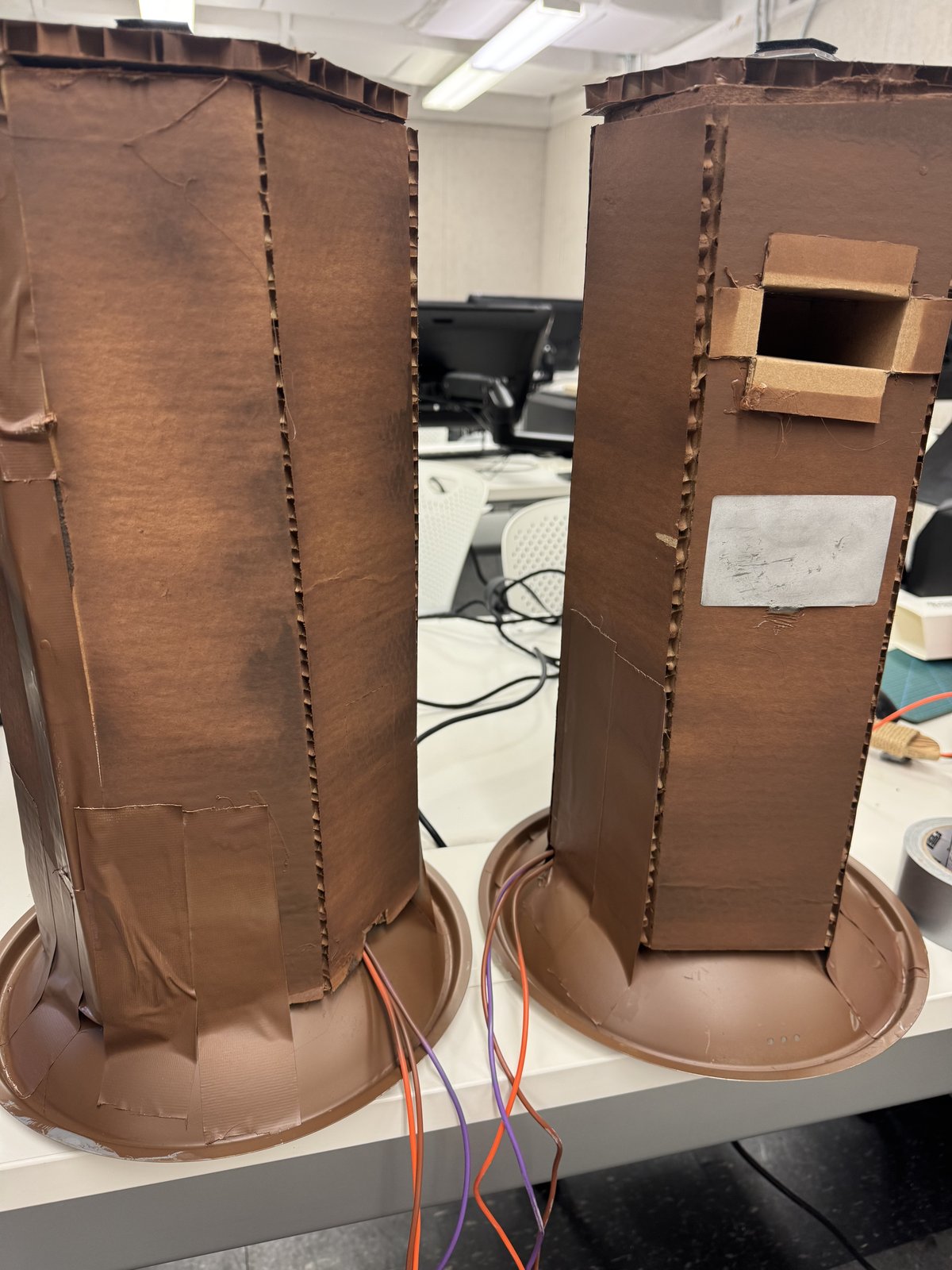 Close view of the two Lumber Climber tree-stump controllers